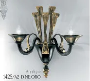 Zwei Lampen, Wandleuchte schwarz und 24 Karat Gold, Gold Metall-Oberflächen.